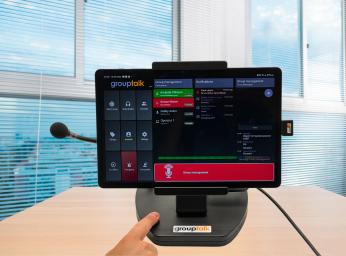 Imtradex mobile desk unit with push-to-talk app installed.