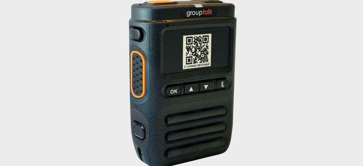 Remote speaker microphone with QR code for bluetooth connection
