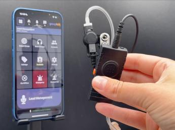iPhone with walkie talkie app installed and Push to Talk headset.