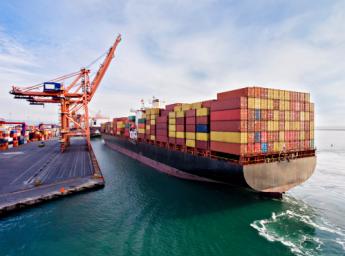 Aerial view of cargo ships in transit.