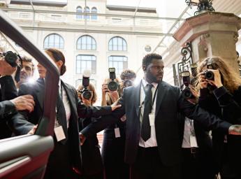 Personal guard providing security at celebrity event.