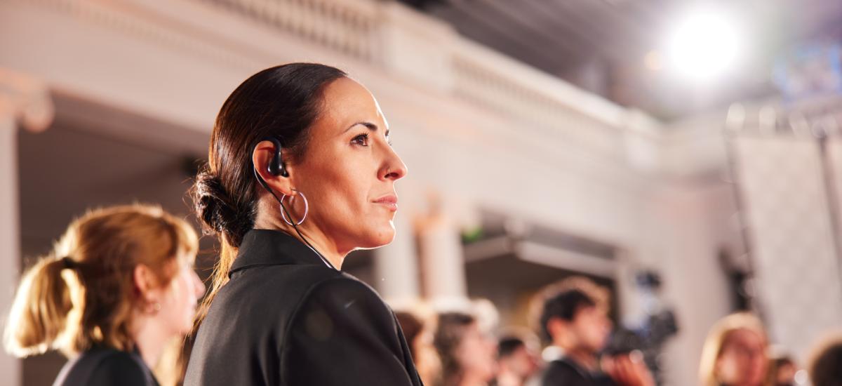 Event security staff with listen-only push-to-talk headset