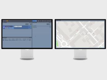 PC screens displaying command and control solution for team monitoring.