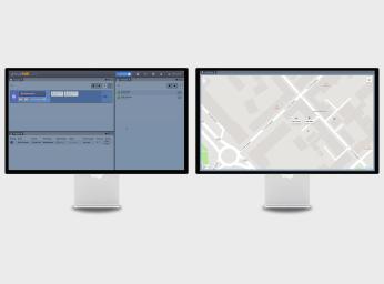 PC screens displaying command and control solution for team monitoring.