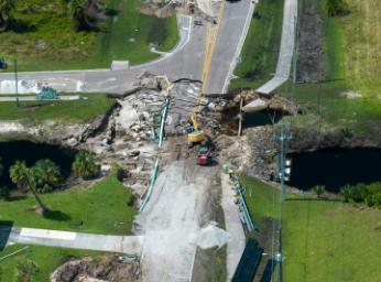 A road destroyed due to a landslide.
