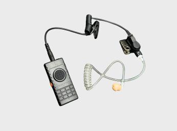 Discreet headset with Push to Talk and phone function buttons.