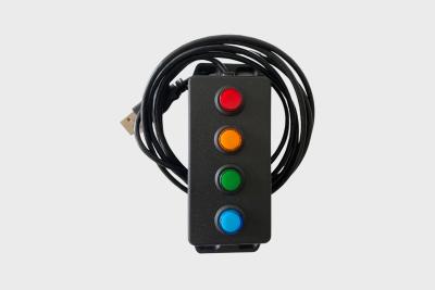 USB accessory with four push to talk buttons for dispatchers.